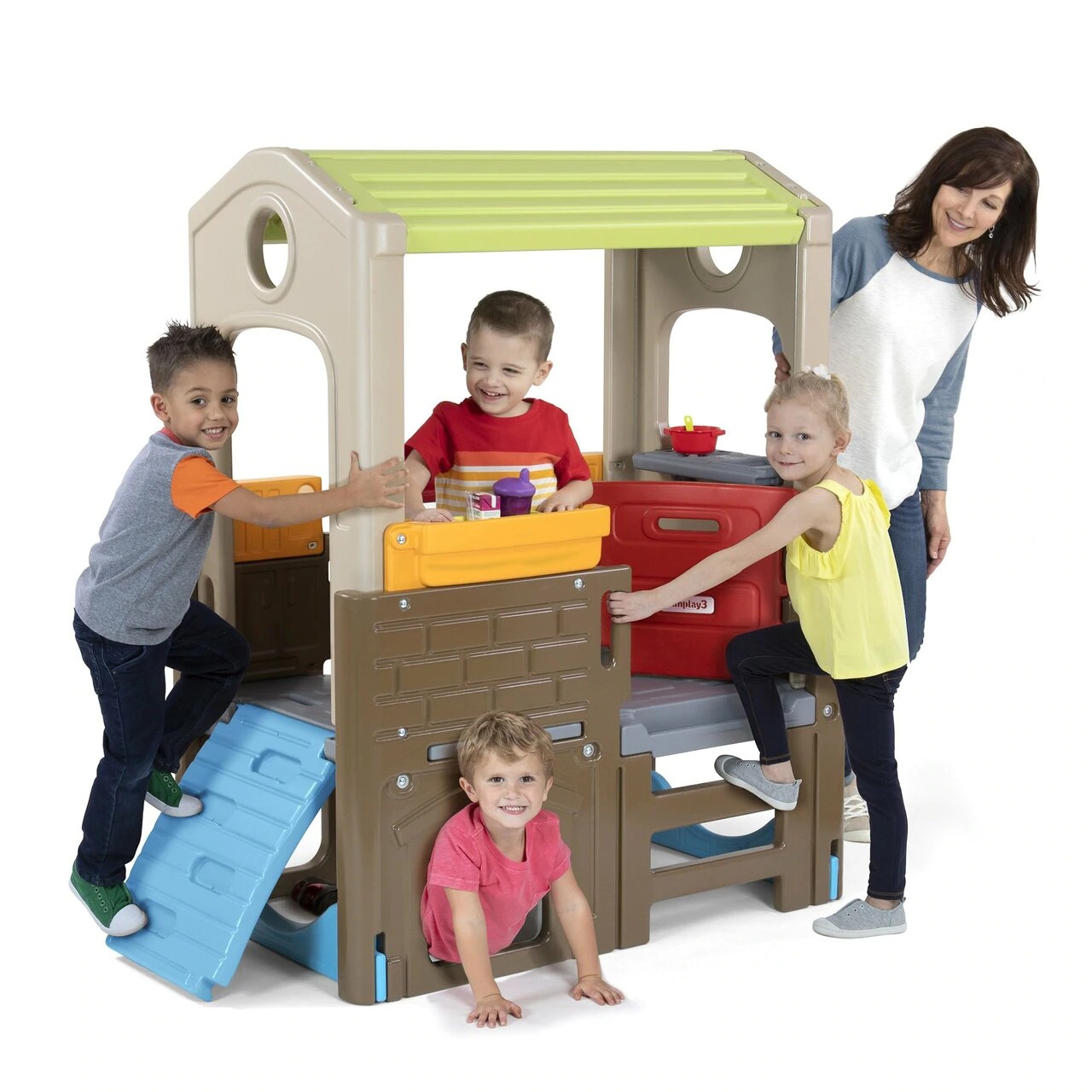 A mother of four kids playing in modular playhouse